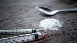 heroin-syringe-and-spoon