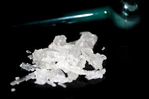 pile-of-meth-crystals-and-a-meth-pipe