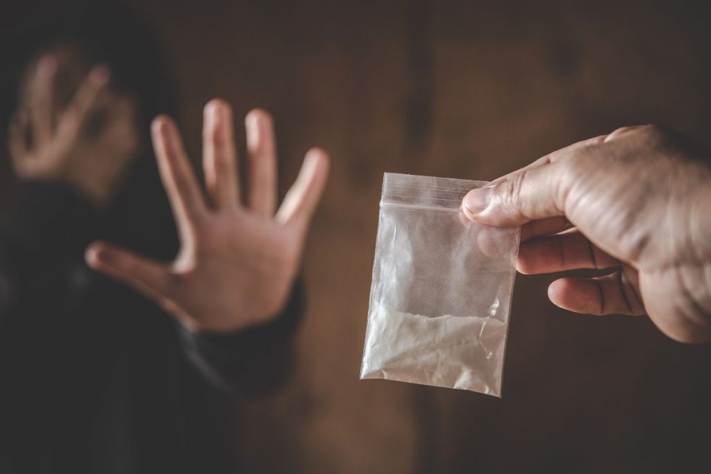 Man refusing drug sachet - tranquilshores.org